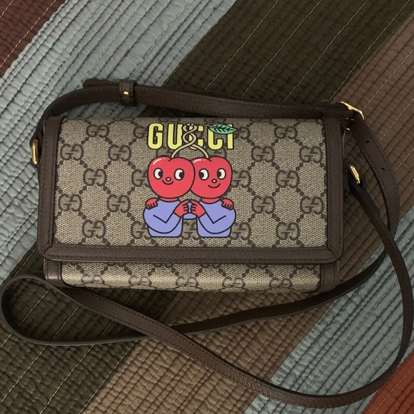 Gucci Brown Crossbody Bag with Playful Graphic - Picture 1 of 7